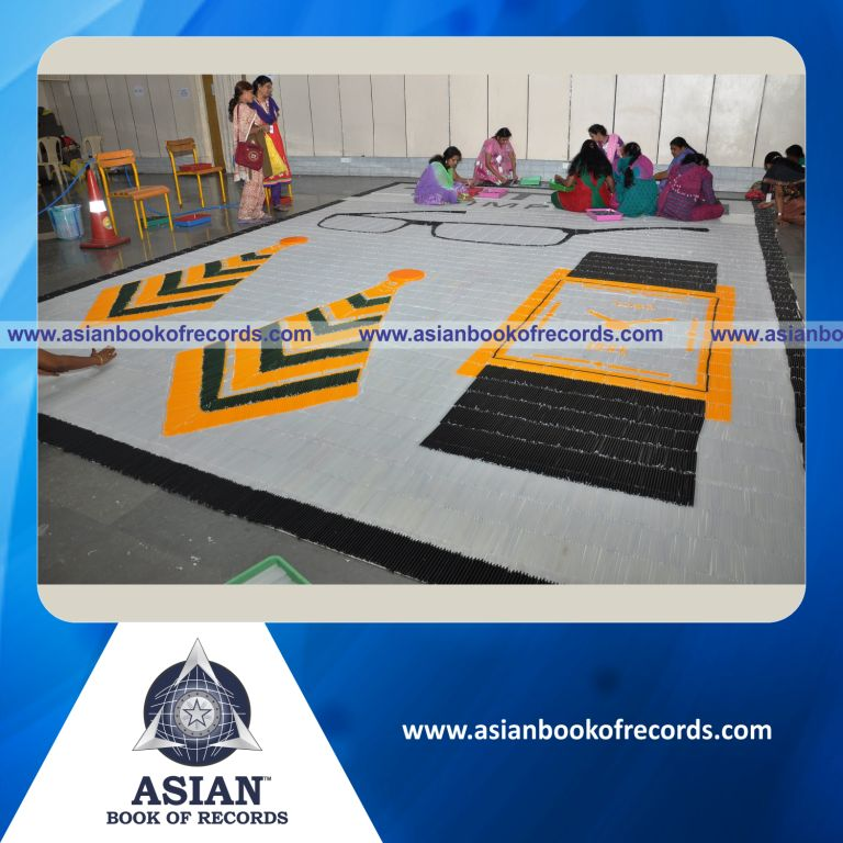 Largest Candle Mosaic by a Team with the Brand Logo and Products of Titan Company Limited