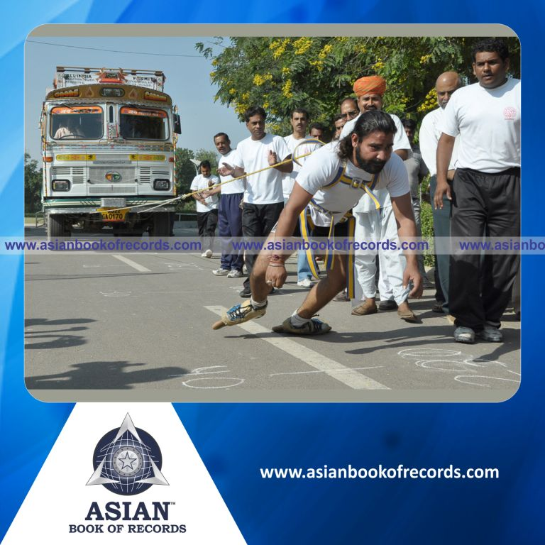 Heaviest Truck Pulled while Wearing Roller Skates by an Individual (Male)