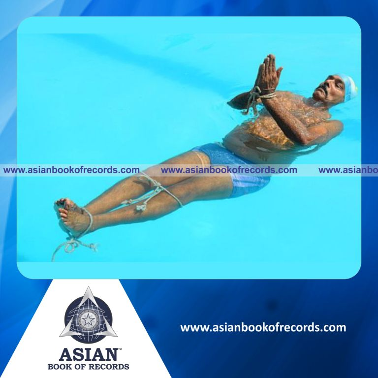Highest Number of Yogasanas Performed in Water by an Individual (Male) in 30 Minutes