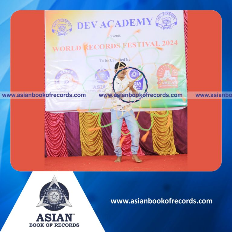 Highest Number of Single Digit Mental Arithmetic Addition Problems (5 Rows) Solved in 7 Minutes while Performing Silambam Ring Ball Simultaneously by 