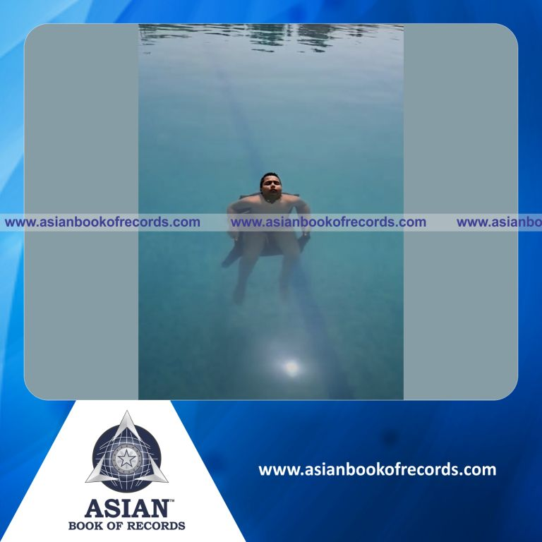 Longest Time to Float while Sitting on a Plastic Chair in a Pool by an Individual (Minor-Male)
