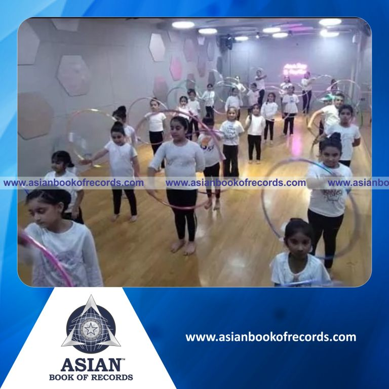 Highest Number of Participants Performing Hula Hoop around Arm Simultaneously for One Minute