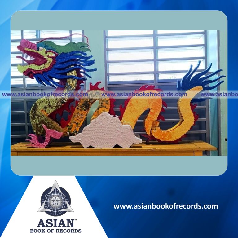 Highest Number of Decorative Foil Pieces Used to Cover a Dragon Sculpture