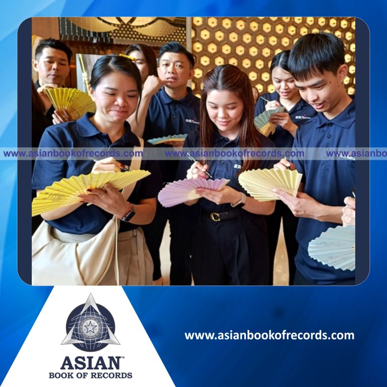 Highest Number of Participants Doing Chinese Calligraphy on Paper Fans Simultaneously (Single Venue)