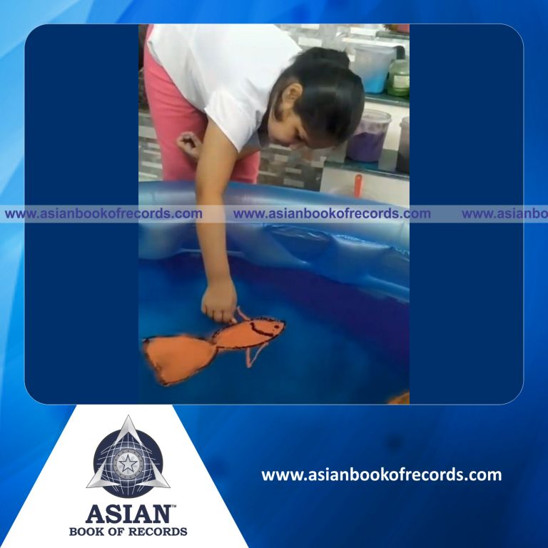 Biggest Rangoli Made on the Surface of a Water Pool by an Individual (Minor-Female)
