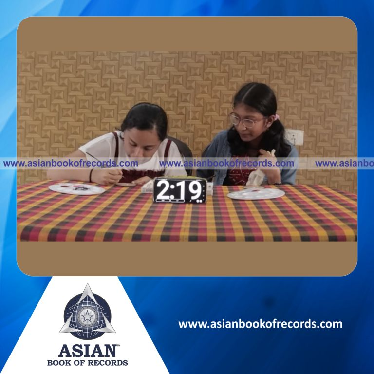 Highest Number of Colors Painted on Two Rice Grains by a Duo