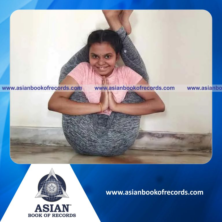 Longest Time to Hold Dwi Pada Sirsasana Pose While Writing Maximum Shlokas