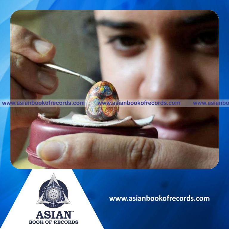 Highest Number of Portraits of Lord Vishnu Drawn on a Betel Nut